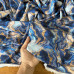 Tecido Estampado Viscoseda Marmorizado Azul e Dourado