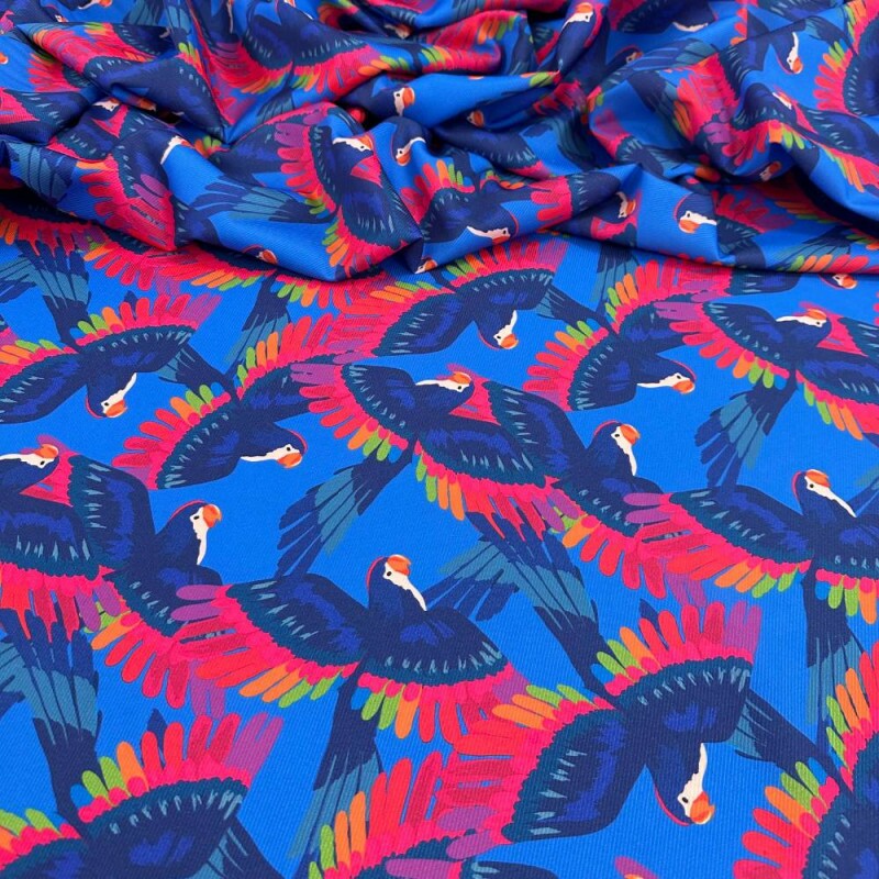 Tecido Estampado Crepe Evolve araras azuis